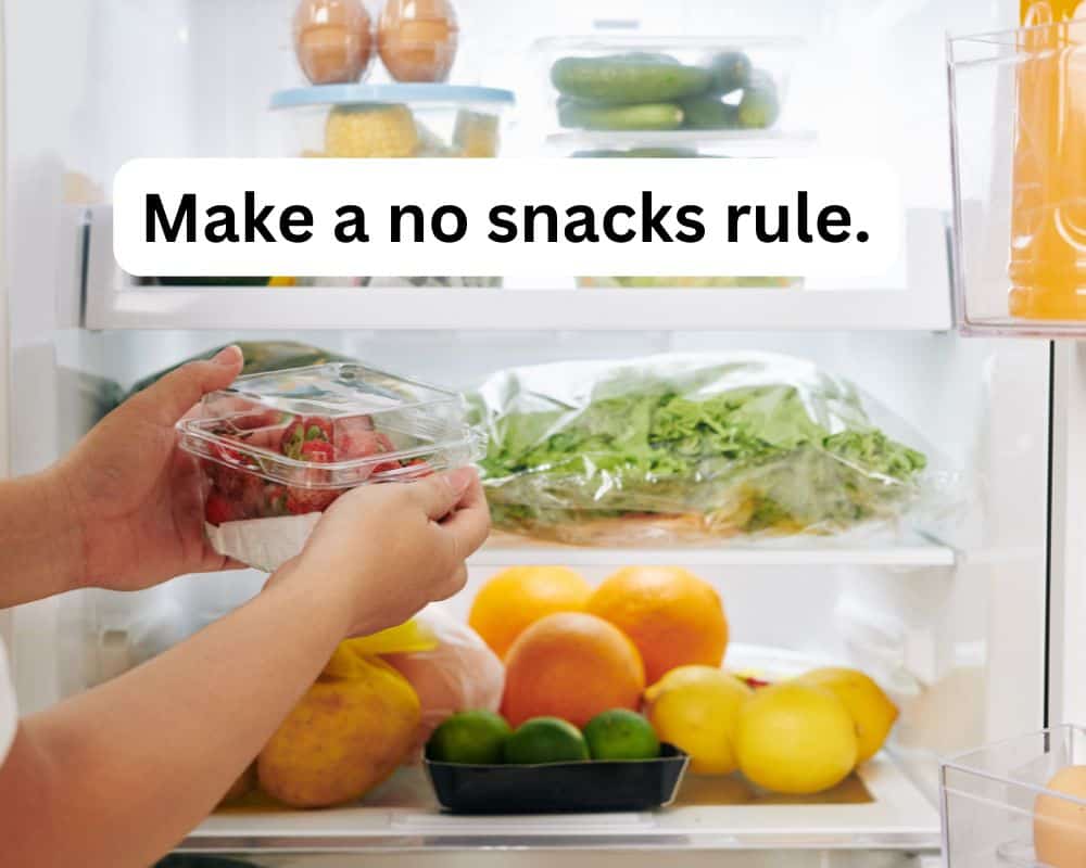 fridge with food and hand