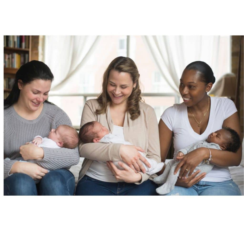 3 moms holding babies