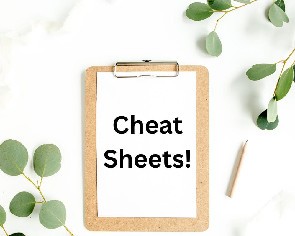 clipboard on table that says cheat sheet