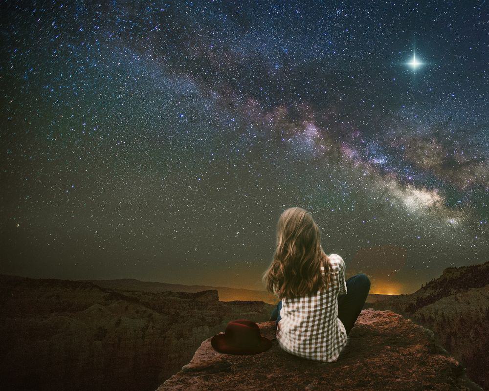 woman gazing at stars
