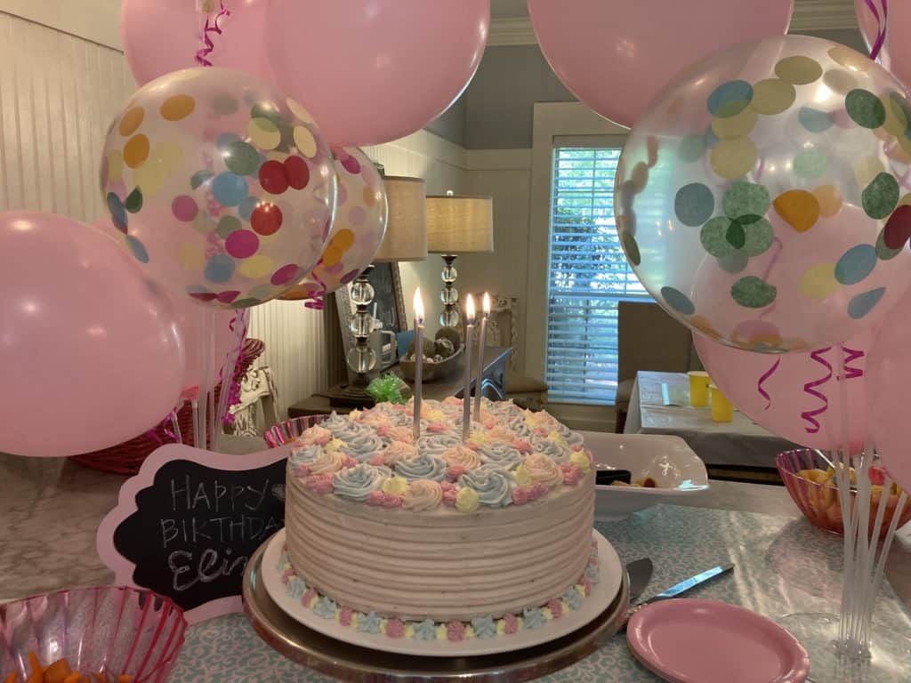 birthday cake and balloons