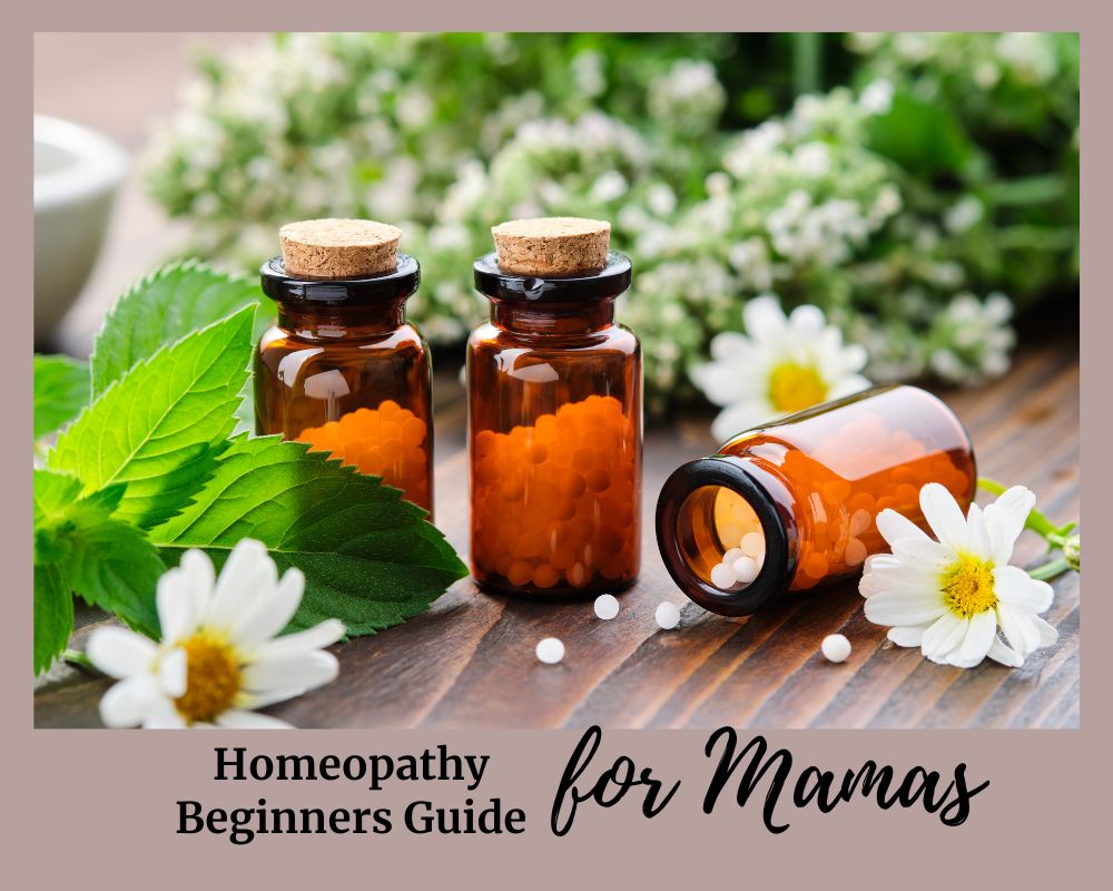 3 bottles of homeopathic remedies and white flower