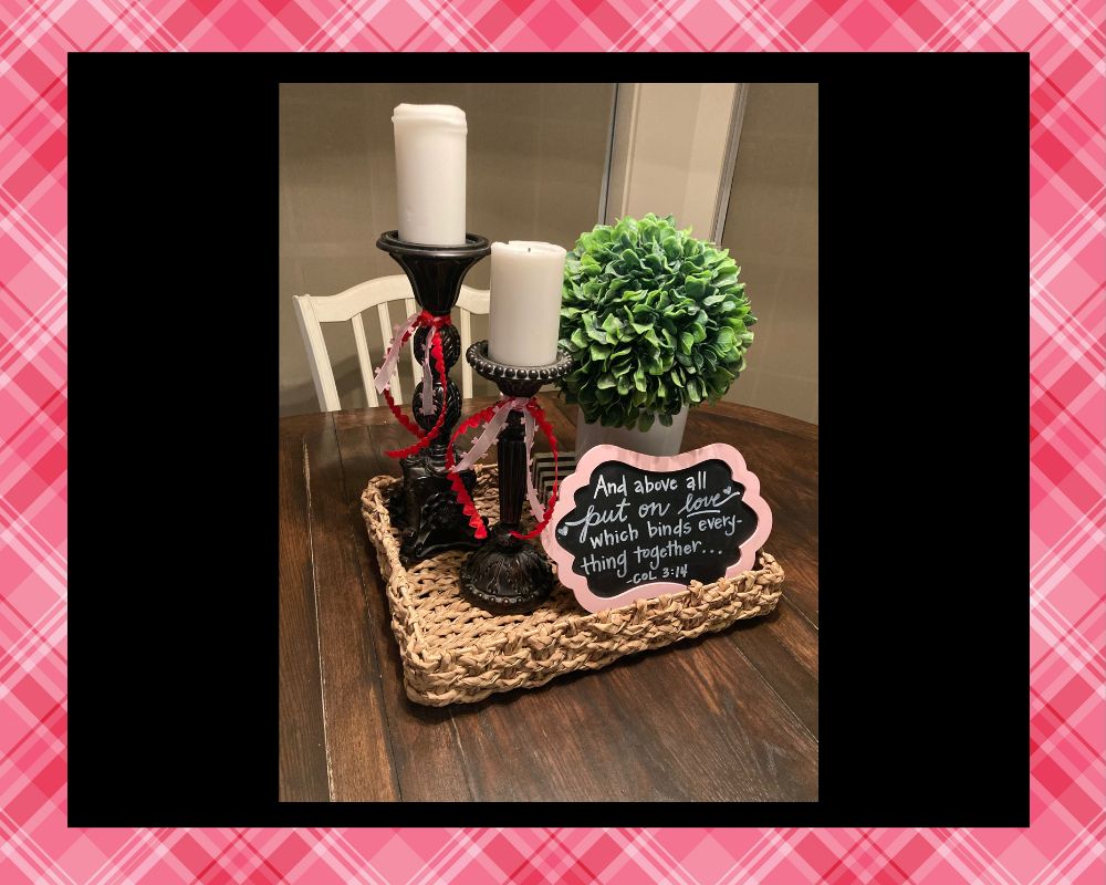 tray with candles, greenery, and framed bible verse