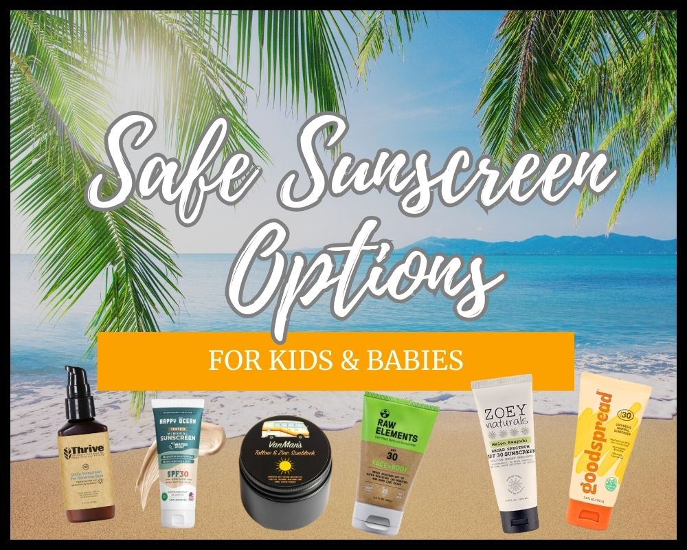 bottles of sunscreen on sand